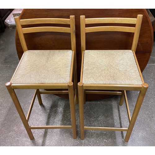 104 - PAIR OF BEECH AND RAFFIA SEATED KITCHEN HIGH CHAIRS