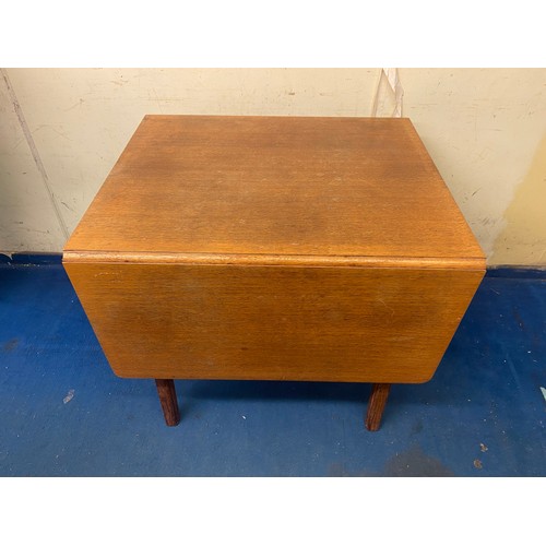 11 - LATE 1950S/60S LIGHT OAK DROP FLAP DINING TABLE WITH SIDE BOARD ENSUITE