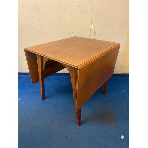 11 - LATE 1950S/60S LIGHT OAK DROP FLAP DINING TABLE WITH SIDE BOARD ENSUITE