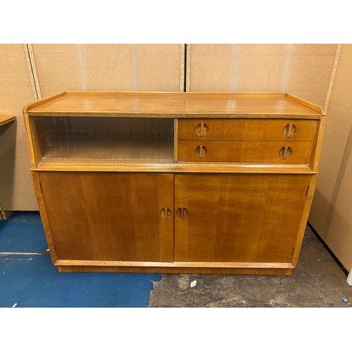 11 - LATE 1950S/60S LIGHT OAK DROP FLAP DINING TABLE WITH SIDE BOARD ENSUITE