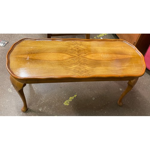 56 - WALNUT QUARTER TOPPED OVAL COFFEE TABLE ON CABRIOLE LEGS