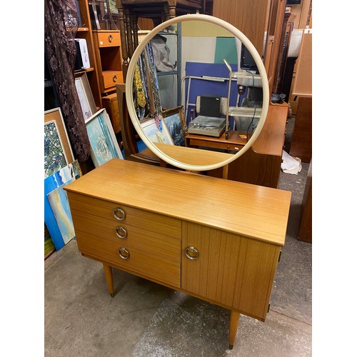 48 - SCHREIBER 1970S TEAK EFFECT DRESSING TABLE WITH CIRCULAR MIRROR AND BEDSIDE UNIT