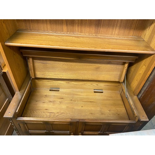 63 - ERCOL ELM LOUNGE UNIT WITH OPEN SHELVES