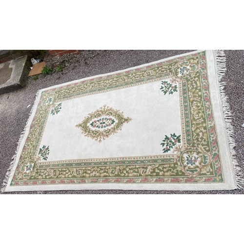 14 - WOOLEN FLORAL PATTERN CREAM GROUND CARPET 245cm x 158cm