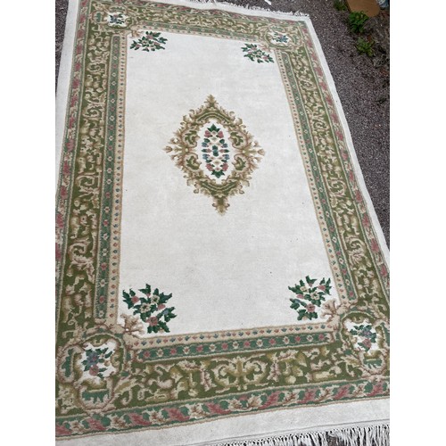 14 - WOOLEN FLORAL PATTERN CREAM GROUND CARPET 245cm x 158cm