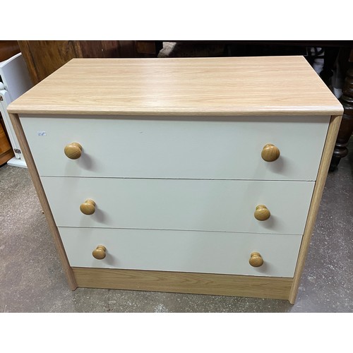 186 - LIGHT WOOD EFFECT AND WHITE THREE DRAWER CHEST