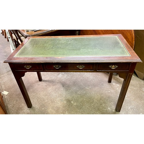 136 - REPRODUCTION GEORGE III STYLE MAHOGANY LEATHER TOPPED WRITING TABLE FITTED WITH THREE DRAWERS