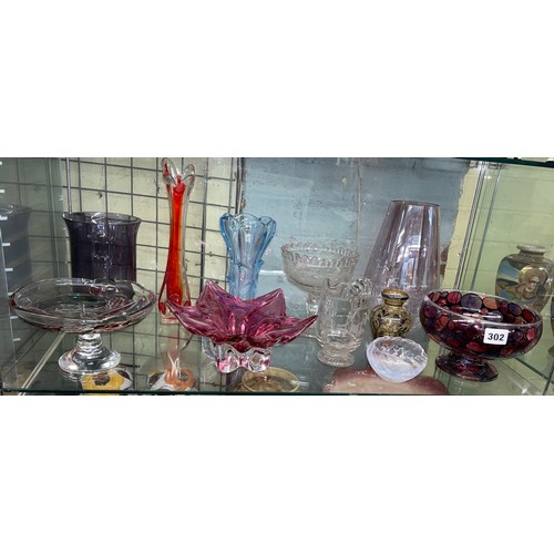 302 - SHELF OF COLOURED AND PRESSED GLASSWARES