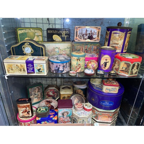 304 - TWO SHELVES OF COLLECTABLE ADVERTISING TINS