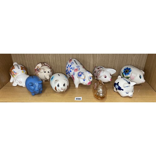 456 - SHELF OF CERAMIC AND GLASS PIG MONEY BANKS