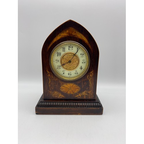 421 - EDWARDIAN MANTLE TIME PIECE WITH FRENCH MOVEMENT IN A MARQUETRY STYLE LANCET CASE