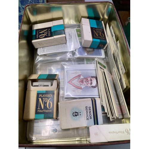 465 - TIN OF VARIOUS BROOKE BOND TEA CARDS, TWO BLUE LAGOON VINTAGE STAMP ALBUMS AND OTHER COLLECTORS CARD... 