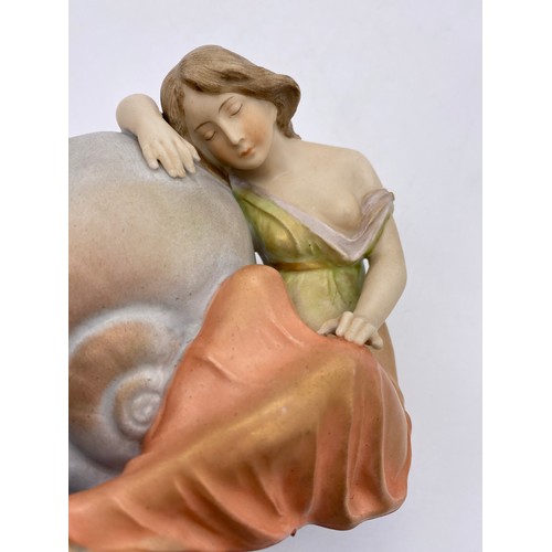 491 - ROYAL VIENNA AUSTRIAN PORCELAIN FIGURE OF SEATED FEMALE WITH A CONCH SHELL A/F TO FOOT