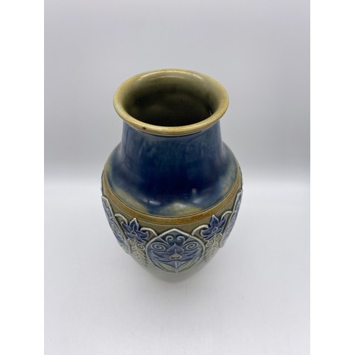 483 - ROYAL DOULTON STONEWARE BALUSTER VASE WITH APPLIED OVAL FLORAL PENDANTS AND BELL HUSKS