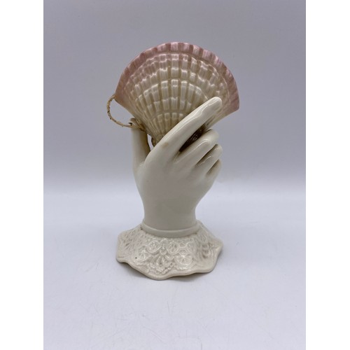 490 - SECOND PERIOD BELLEEK PORCELAIN HAND WITH SCALLOP SHELL AND A BELLEEK SHAMROCK PANELLED FLARED VASE