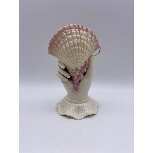 490 - SECOND PERIOD BELLEEK PORCELAIN HAND WITH SCALLOP SHELL AND A BELLEEK SHAMROCK PANELLED FLARED VASE