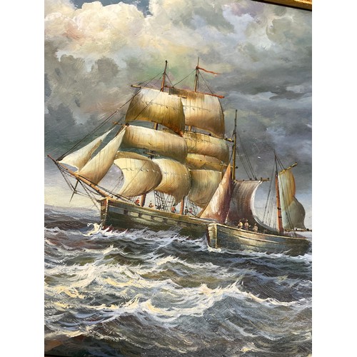 562 - 20TH CENTURY OIL ON PANEL OF SAILING SHIP WITH SMACK ALONGSIDE IN ORNATE GILDED HEAVY FRAME