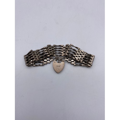 516 - SILVER FIVE BAR GATE BRACELET WITH HEART PADLOCK AND SAFETY CHAIN