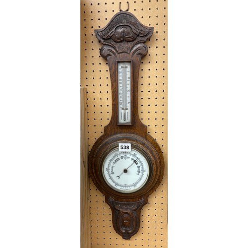 538 - CARVED OAK CASED ANEROID BAROMETER