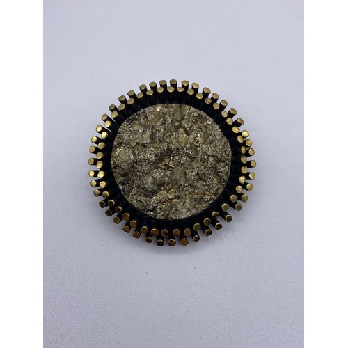 524 - P SARPANEVA BRONZE TEXTURED PENDANT ON CHAIN AND A FINNISH PYRITE CIRCULAR BROOCH