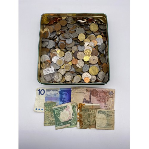 498 - TIN OF VARIOUS WORLD COINS AND SOME BANK NOTES