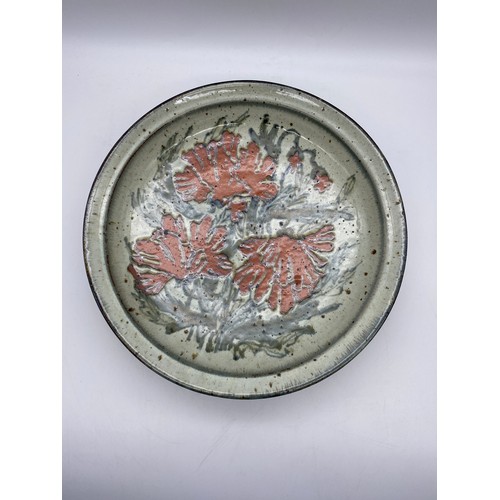 478 - COLIN KILLAN STUDIO POTTERY WALL CHARGER DECORATED WITH ABSTRACT POPPIES