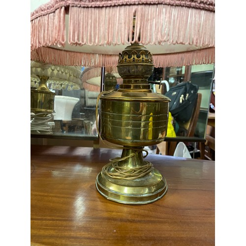 136 - THREE BRASS TABLE LAMPS AND CONVERTED OIL LAMP