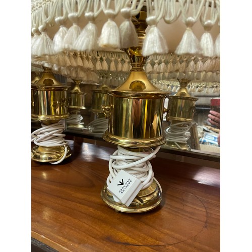 136 - THREE BRASS TABLE LAMPS AND CONVERTED OIL LAMP