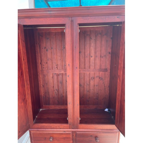 80 - STAINED PINE DOUBLE WARDROBE WITH DRAWERS