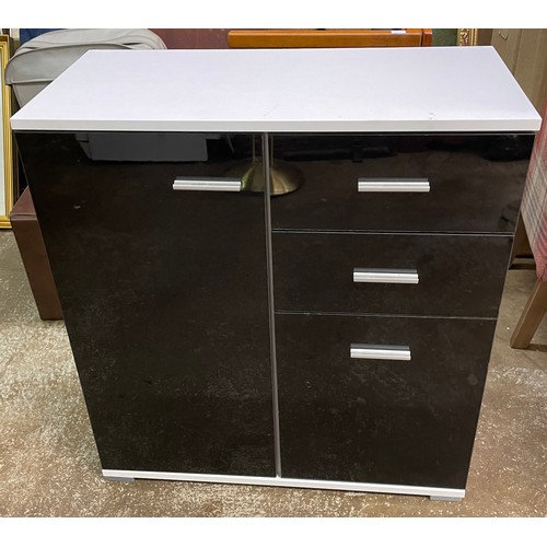 65 - BLACK AND WHITE GLOSS MEDIA CHEST