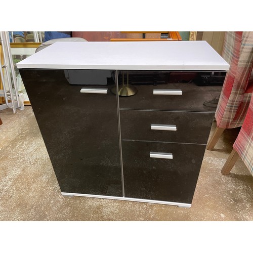65 - BLACK AND WHITE GLOSS MEDIA CHEST