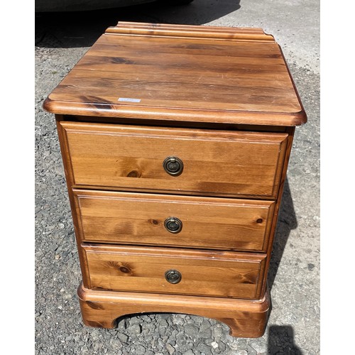73 - PINE THREE DRAWER BEDSIDE CABINET