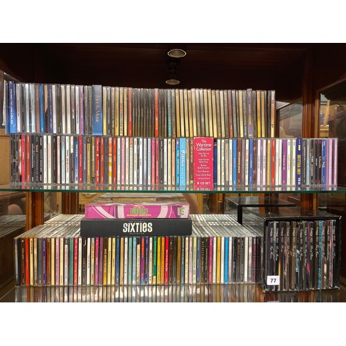 77 - TWO SHELVES OF CDS INCLUDING CLASSICAL AND SIXTIES