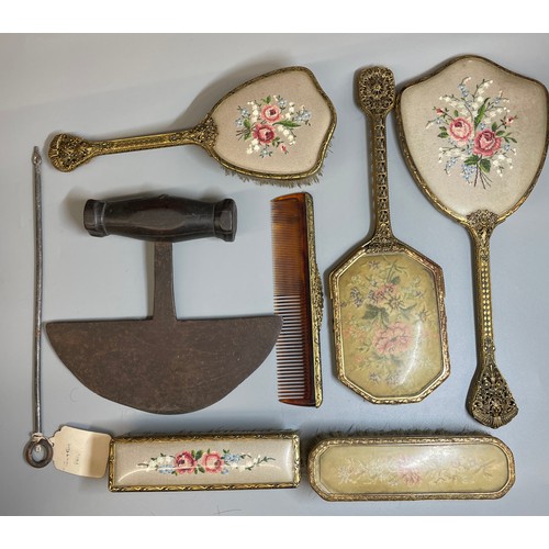 560 - NEEDLE POINT BACKED GILDED DRESSING TABLE SET, THATCH PEG, AND VINTAGE HERB CHOPPER