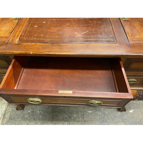 73 - EDWARDIAN MAHOGANY KNEEHOLE DESK WITH LEATHER SKIVER GALLERY BACK AND BLIND FRET CARVED DRAWER FRONT... 