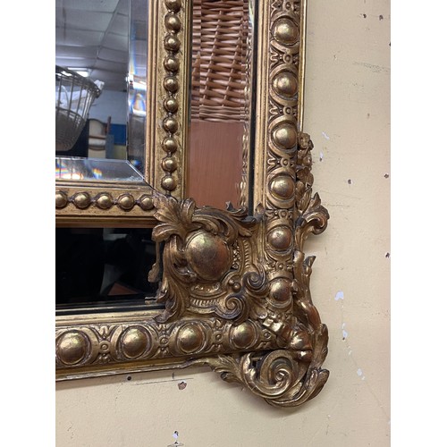 230 - GILT GESSO FLORENTINE STYLE MIRROR WITH FLORAL EGG AND DART DECORATION 120CM X 83CM