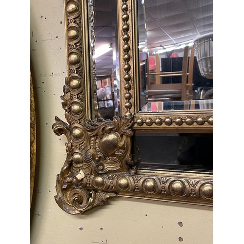 230 - GILT GESSO FLORENTINE STYLE MIRROR WITH FLORAL EGG AND DART DECORATION 120CM X 83CM