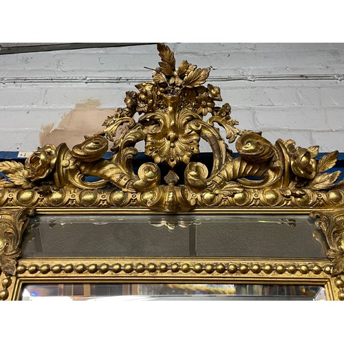 230 - GILT GESSO FLORENTINE STYLE MIRROR WITH FLORAL EGG AND DART DECORATION 120CM X 83CM