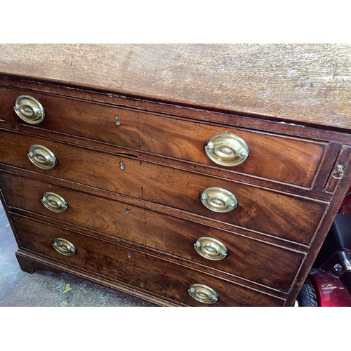 77 - GEORGE III MAHOGANY BUREAU THE FALL FLAP ENCLOSING A FITTED INTERIOR WITH LOPPERS AND FOUR GRADUATED... 