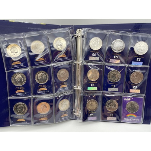 554 - A4 BINDER OF GB UNCIRCULATED £5 COINS