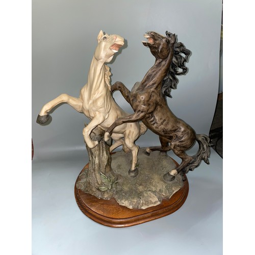 359 - RESIN MOULDED WILD STALLION FIGURE GROUP, AND SPARTAN WARRIOR FIGURE