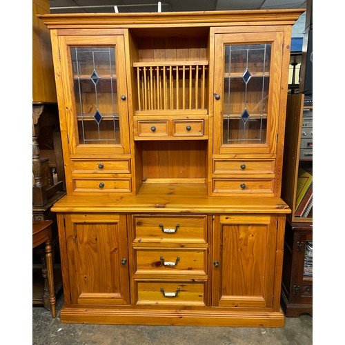 113 - EVERYDAY COUNTRY PINE DRESSER WITH GLAZED LEADED UPPER DOORS, PLATE RACK AND WITH DELFT HANDLES