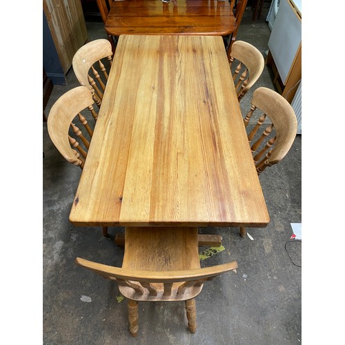 155 - PINE FARMHOUSE KITCHEN TABLE AND SIX SPINDLE BACK CHAIRS