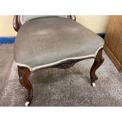 133 - VICTORIAN ROSEWOOD CARVED UPHOLSTERED NURSING CHAIR