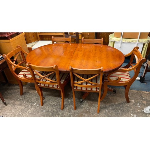 57 - REPRODUCTION YEW EXTENDING DINING TABLE AND SIX CHAIRS