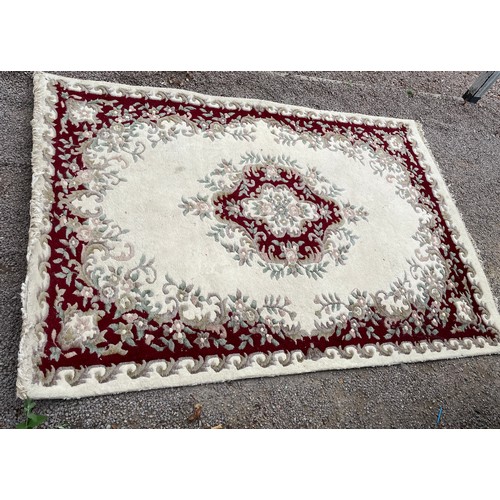 279 - LARGE CREAM AND RED PATTERN WOOLLEN CARPET 275cm x 188cm