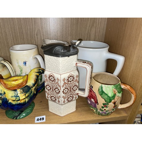 331 - SHELF OF POTTERY JUGS INCLUDING HENS AND COCKEREL