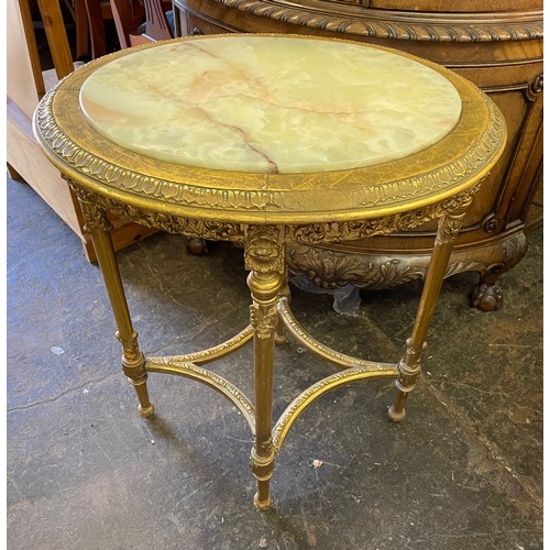 227 - FRENCH STYLE GILDED OVAL OCCASIONAL TABLE WITH INSET ONYX TOP