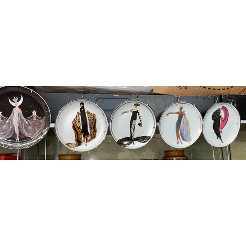 243 - EIGHT ERTE DECORATIVE WALL PLATES