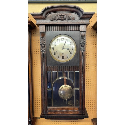 169 - EARLY 20TH CENTURY OAK CASED PENDULUM CHIMING WALL CLOCK WITH CARVED BEADED DECORATED CASE